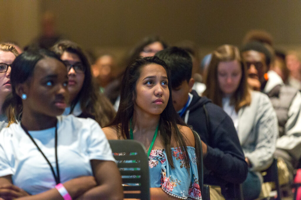 Students listening during a youth drug-prevention presentation.