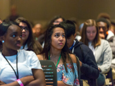 Students listening during a youth drug-prevention presentation.